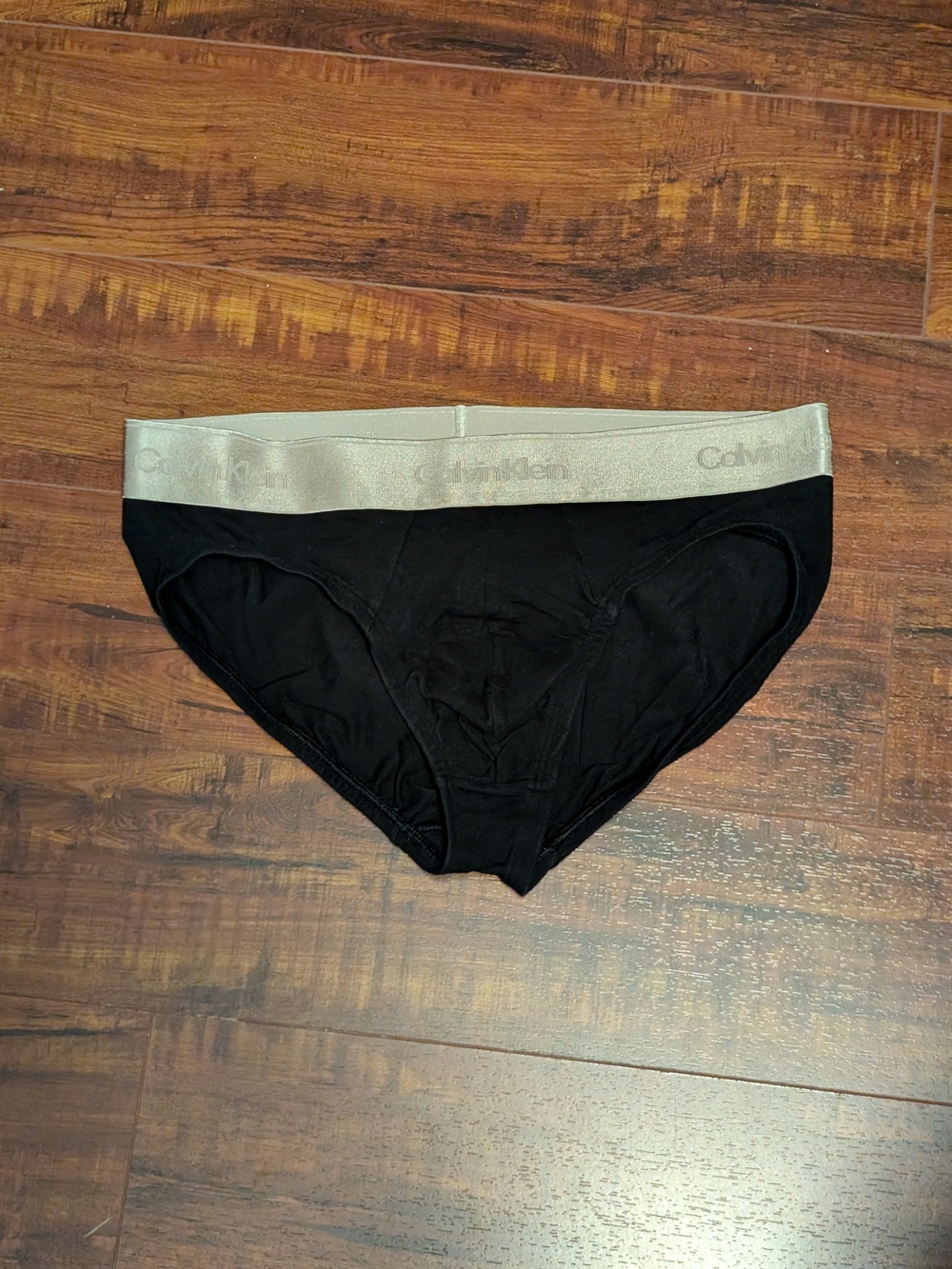 Calvin Klein Underwear Black Briefs with Gold Waistband